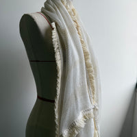 White fringed scarf