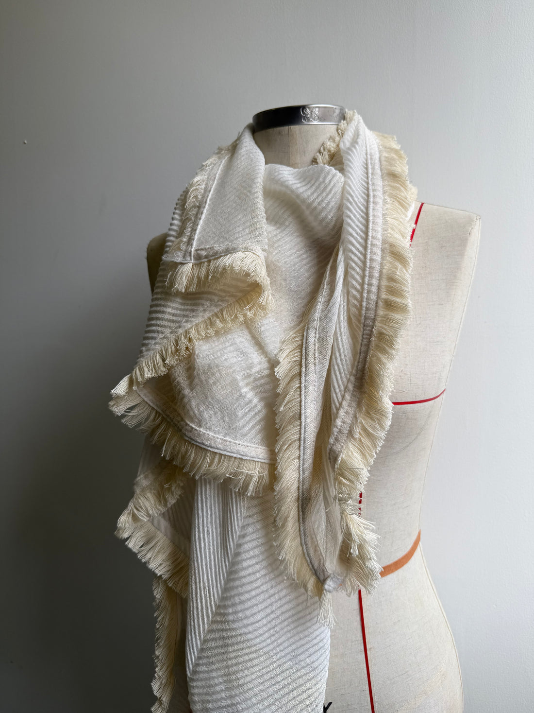 White fringed scarf